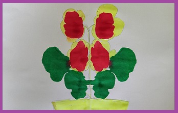 obrazek przedstawia roślinkę z kolorowych kleksów